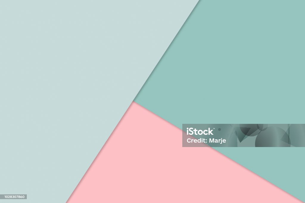 Abstract Background of Overlapping Paper in  Trendy Pastel Colors: Green and Pink - Material Design, Minimalism, Modern, Simple Overlapping sheets of paper in pastel colors. Abstract Material Design Wallpaper for layout. Backgrounds Stock Photo