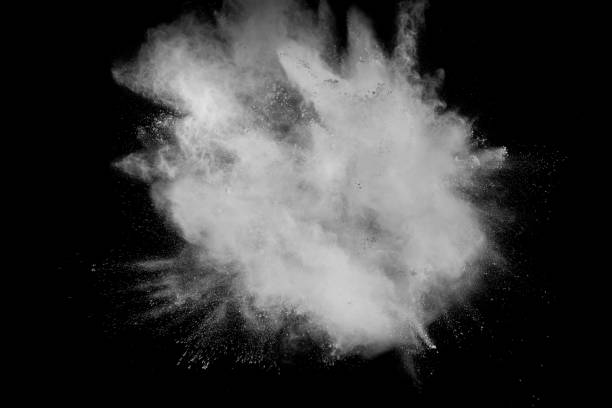 istock Abstract white powder explosion against black background. 1028314758