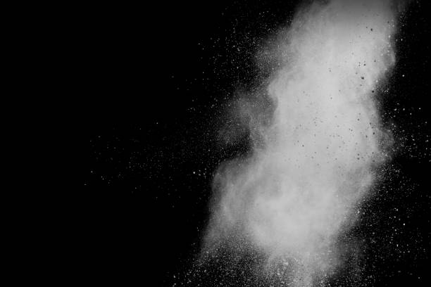 istock Abstract white powder explosion against black background. 1028314780