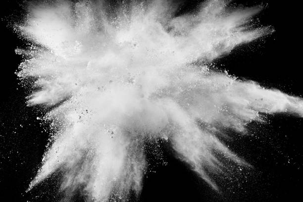 istock Abstract white powder explosion against black background. 1028314796