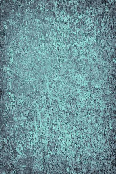 istock Turquoise grunge background. Abstract texture of the old surface. Vintage paint coating pattern 1028315798