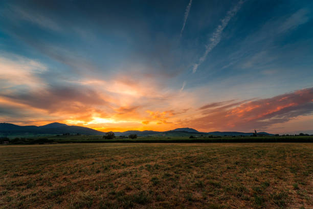 istock sunset on the field in alsace 1028318570