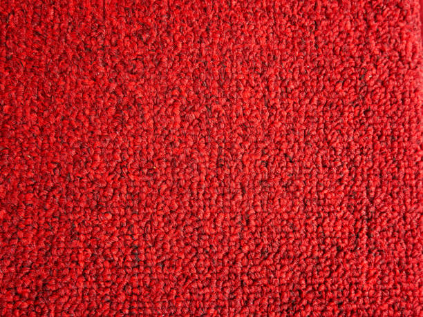 istock Elegance red color carpet texture background 1028318722