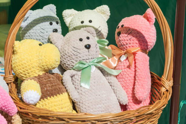istock A soft toy in a large basket. 1028319326