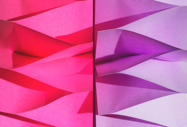 istock Colorful abstract background; note papers in pink, green and violet color 1028319862