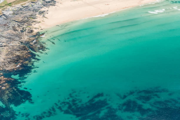 istock Aerial Views over Constantine Bay, North Cornwall on a sunny June day. 1028327448