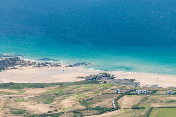 istock Aerial views over Constantine Bay, North Cornwall 1028327464
