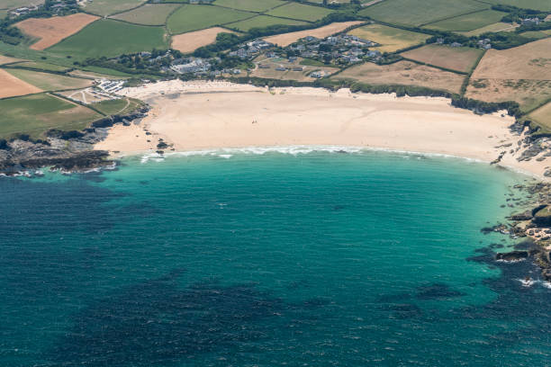 istock Aerial Views over Harlyn Bay Beach, North Cornwall on a sunny June day. 1028327472