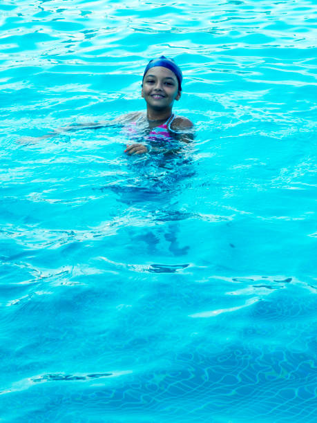 istock diving in the pool-foot outside water 1028334516