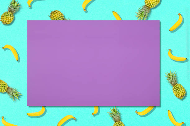 Blank Purple Frame Amidst Fruits On Blue Background