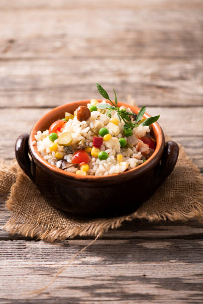 istock Traditional italian rice salad on wood table 1028343400