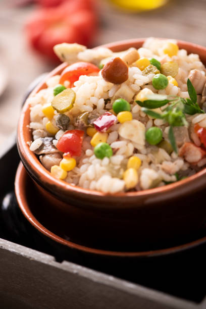 istock Traditional italian rice salad on wood table 1028347082