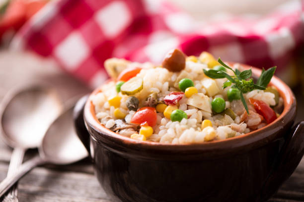 istock Traditional italian rice salad on wood table 1028347346