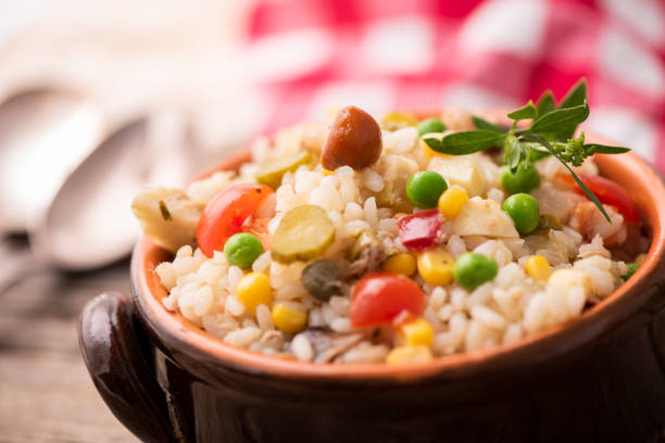istock Traditional italian rice salad on wood table 1028347442