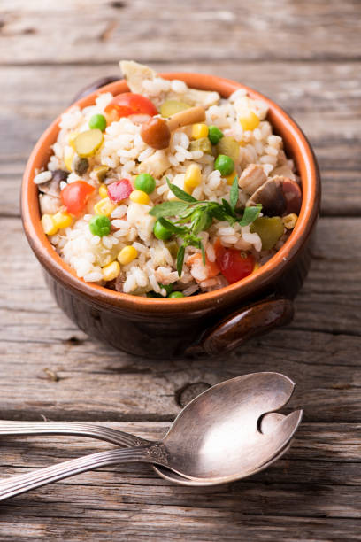 istock Traditional italian rice salad on wood table 1028347618