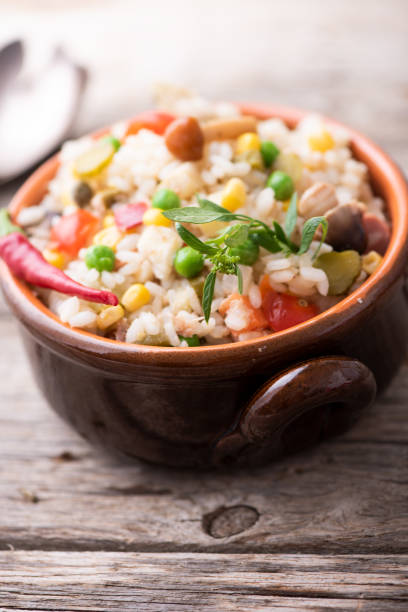 istock Traditional italian rice salad on wood table 1028348412