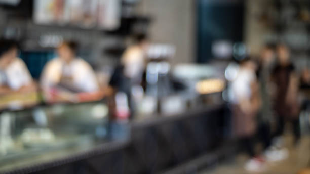 istock Defocused Image Of People In Restaurant 1028355944