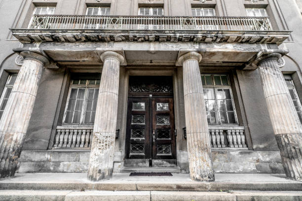 istock Greek pillar building with weathered windows 1028363770