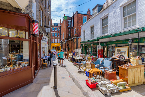 View of Flask Walk, an old street with cafes and  antique arts and crafts shops in Hampstead Village on June 11, 2018 in London