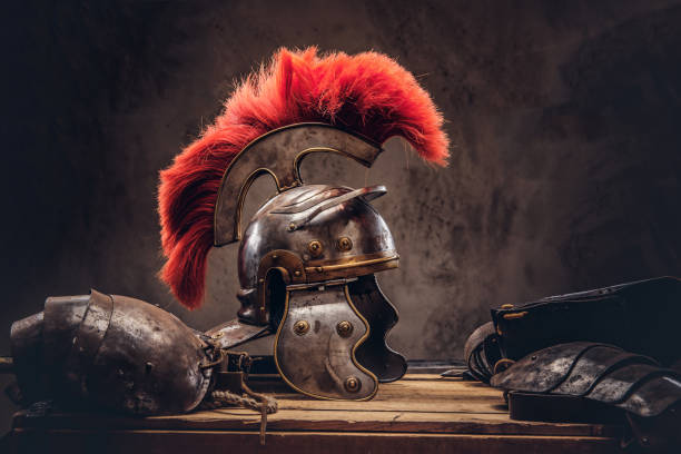 Complete combat equipment of the ancient Greek warrior lie on a box of wooden boards. stock photo