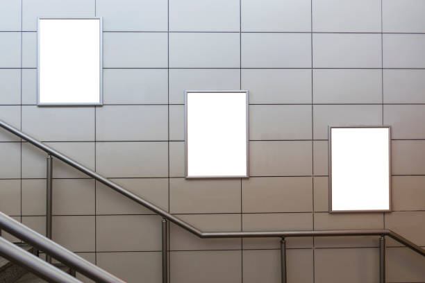 istock Three big vertical / portrait orientation blank billboard with stairs background 1028375252