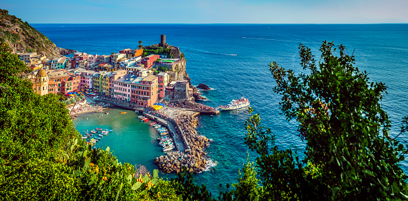 Vernazza, Italy. Vernazza is a town and comune located in the province of La Spezia, Liguria, northwestern Italy. It is one of the five towns that make up the Cinque Terre region.