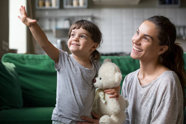 Kid and single mother looking forward to good future concept