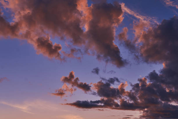 istock Sky at sunset with purple orange and blue hues 1028379416