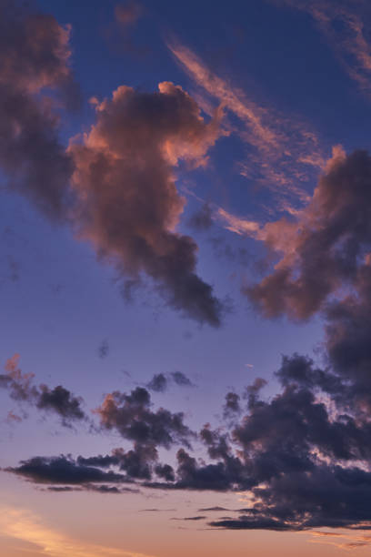 istock Sky at sunset with purple orange and blue hues 1028379600