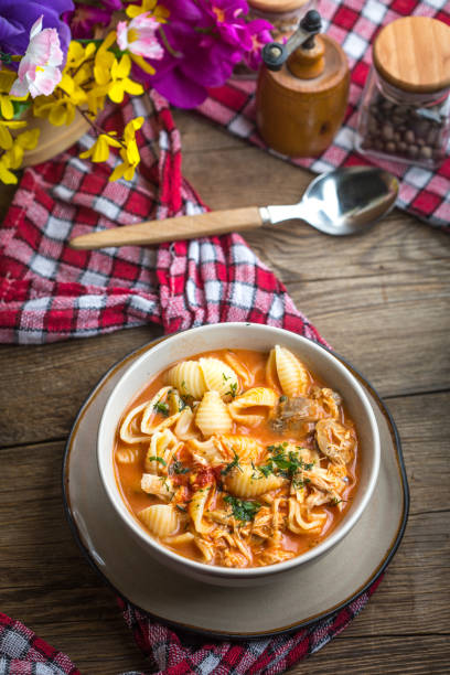 istock Fresh tomato soup with conchigliette. 1028387622