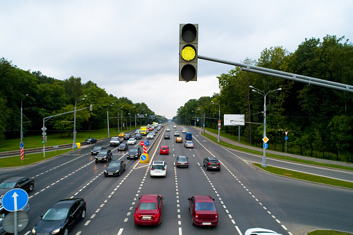 A traffic light shows a yellow signal. Aerial photography.