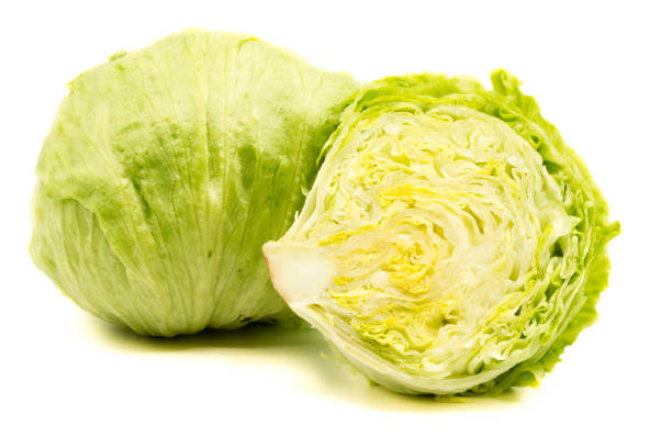 istock Green iceberg lettuce isolated on white background 1028397886