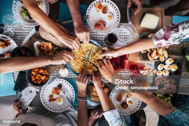 Food Catering Cuisine Culinary Gourmet Party Cheers Concept Friendship And Dinner Together Mobile Phones On The Table Pattern And Background Colorful Image With People Eating And Taking Food During An Event Stock Photo - Download Image Now