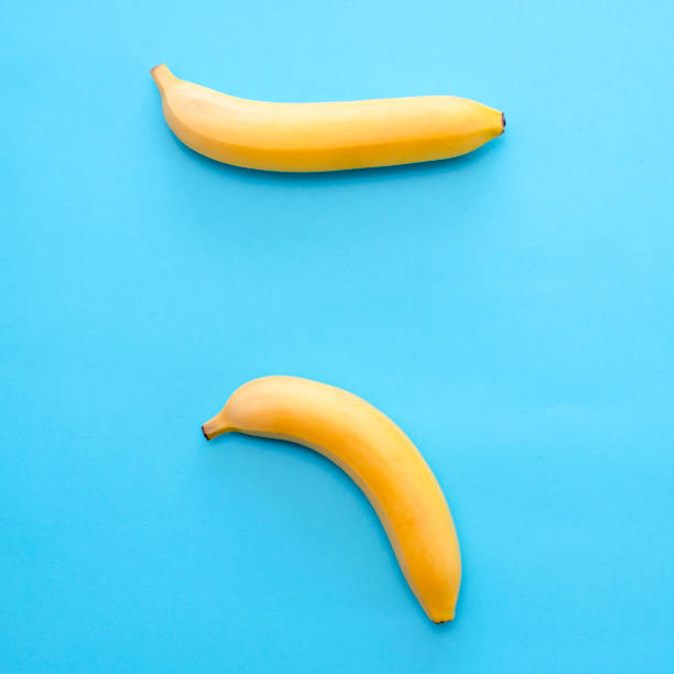 istock Composition of yellow bananas to display problems with the potency of men 1028404134
