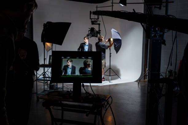 istock People Working Behind the Scenes on a Film Set 1028404678