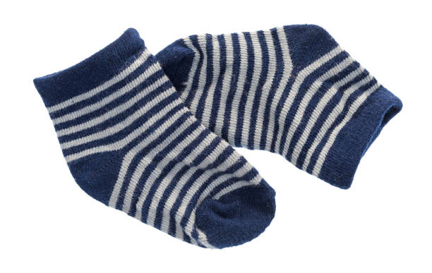 istock Blue and white striped baby socks 1028407746