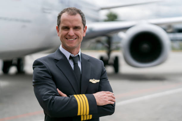 istock Portrait of a happy pilot smiling 1028421516