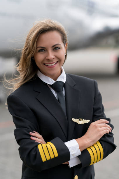 istock Portrait of a successful female pilot 1028421552
