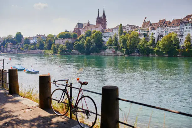 Scenic view of Rhine embankment with people swimming in the river in Basel, Switzerland