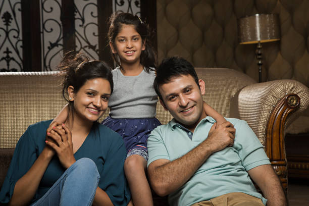 istock Happy familiy spending fun time at home - Stock image 1028435488