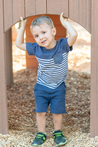 istock Male toddler posing looking at the camera 1028438398