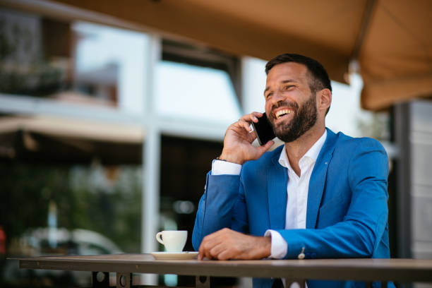 istock Hadsome young businessman talking on his phone 1028438634