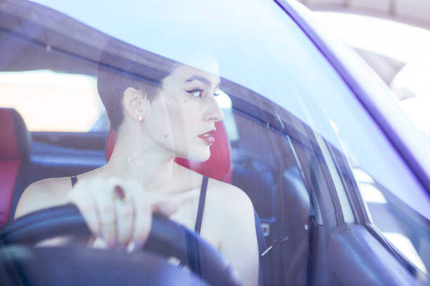 istock modern woman driving on the city 1028462972