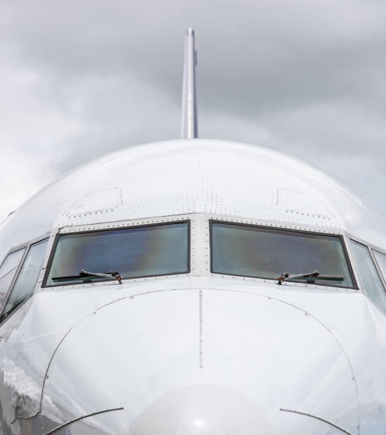 istock Close-up on an airplane's cockpit from outside 1028463098