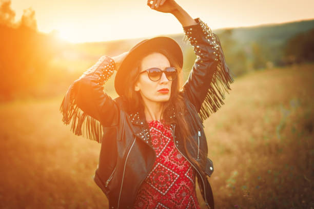 istock happy boho woman enjoying in the nature 1028475412