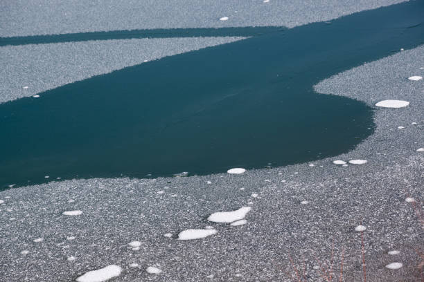 istock Partially frozen lake 1028484094