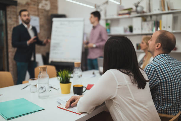 istock Young business people having a presentation in the office 1028484202