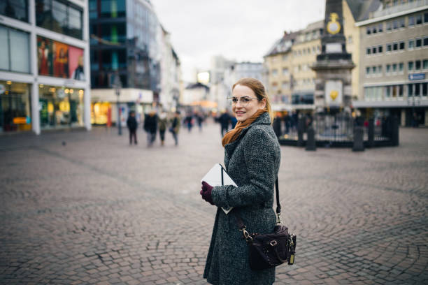 istock Young woman with a digital tablet enjoying a day outdoors in Germany 1028486882