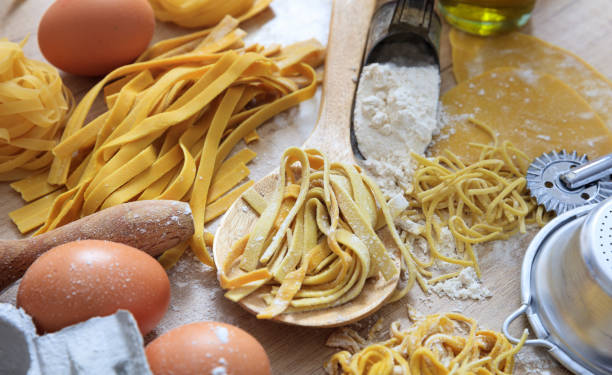 istock Fresh tagliatelle pasta homemade preparation 1028504820