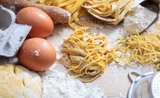 istock Fresh tagliatelle pasta homemade preparation 1028504826